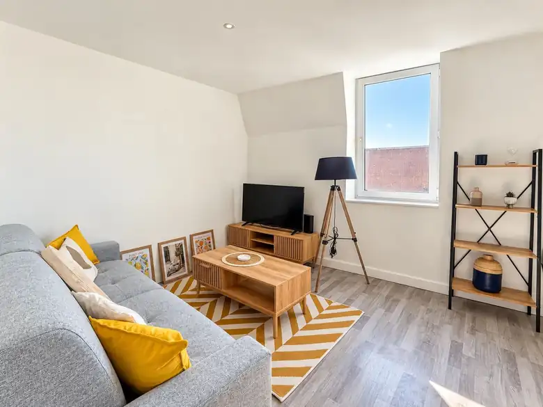 Le salon, côté fenêtre — Lot d’appartements de 59m² à Dunkerque
