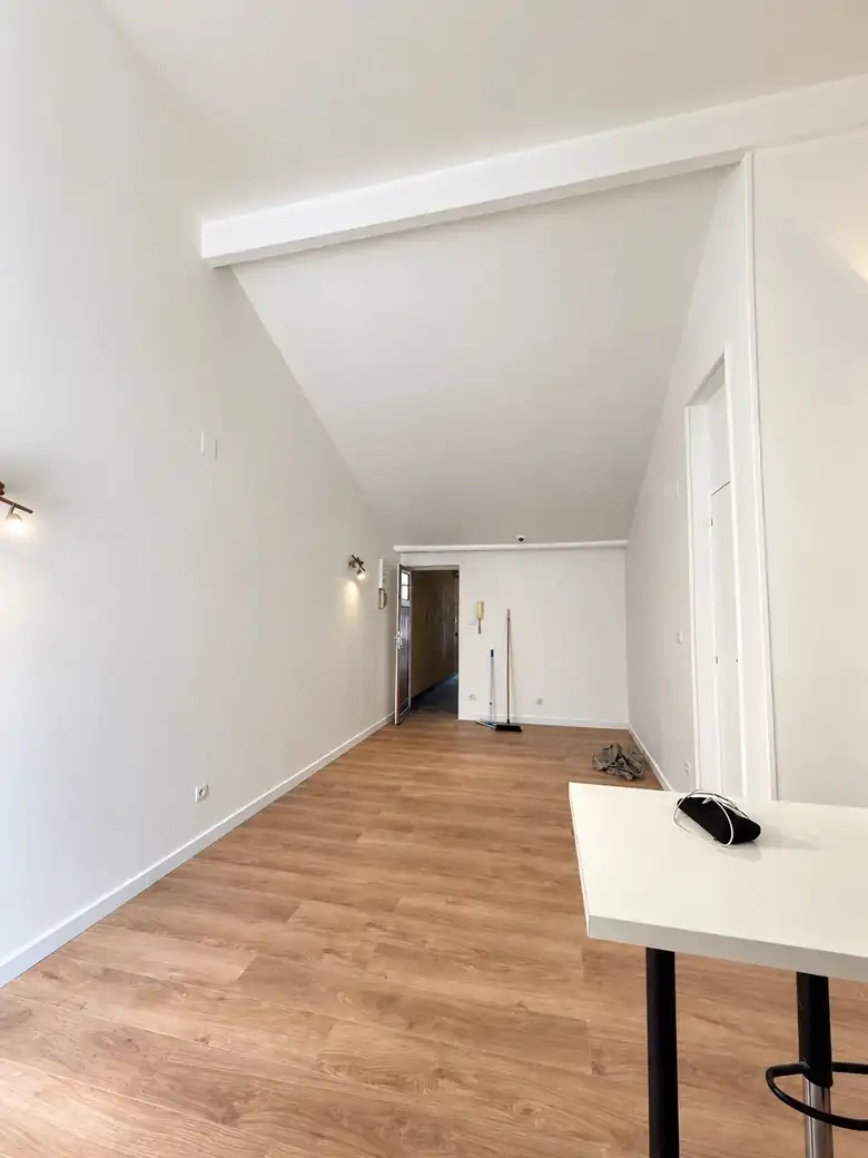 Le volume sous la charpente — Appartement de 26m² à Reims